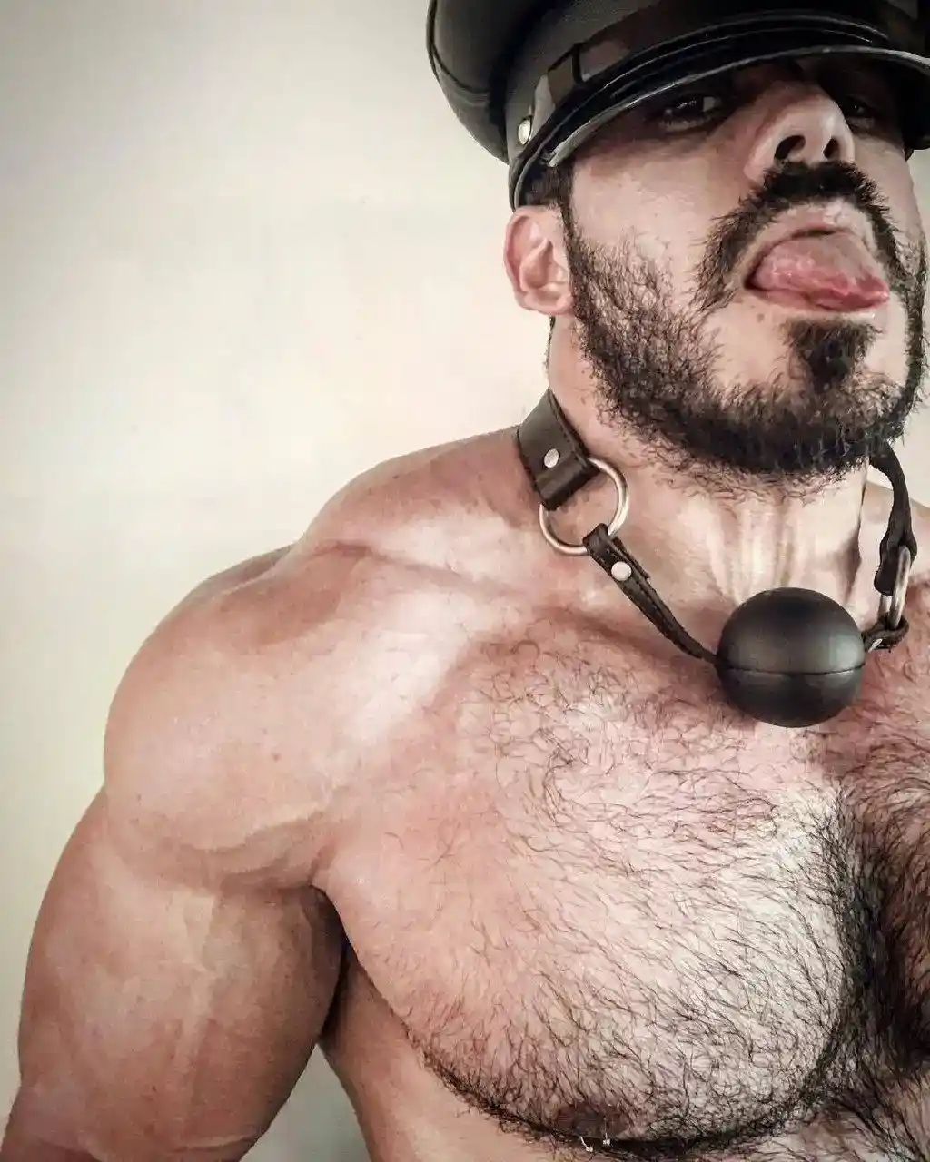 Bondage and restraint imagery representing a private fetish community for men